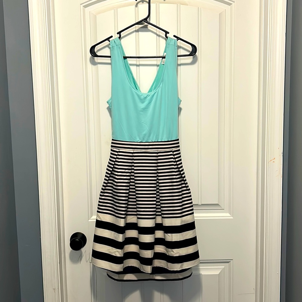 Teal/ black and white striped dress with cross cross in the back